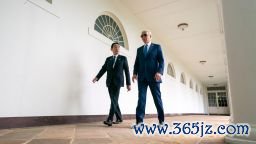 President Joe Biden and Japanese Prime Minister Fumio Kishida walk on the colonnade as they make their way to a meeting in the Oval Office at the White House on April 10 in Washington, DC.